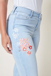 Jeans bleu fleur de côté droit