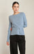 Haut en tricot à boucle Dex, coloris bleu pâle, vêtement porté