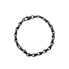 La Maison du Bleuet black PVD stainless steel link bracelet with a fluid, modern design and secure clasp.