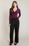 Pantalon large en satin à blocs de couleur Dex, coloris noir, vêtement porté en tenue