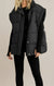 Veste matelassée coupe carrée Dex, coloris noir, vêtement porté