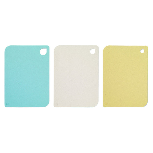 Planches à découper de couleur bleu, gris et jaune fait de paille recyclé et 